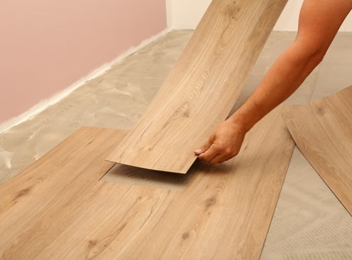 Pose parquet sur carrelage