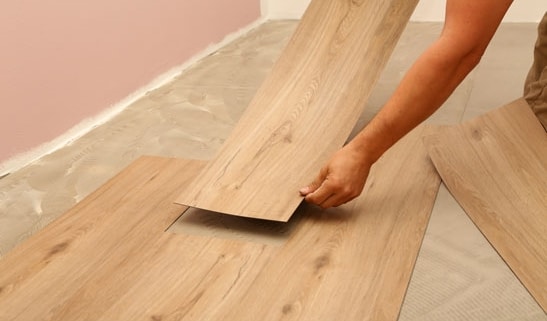 Pose parquet sur carrelage