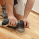 Quelles techniques pour poncer un parquet avec une petite ponceuse ?